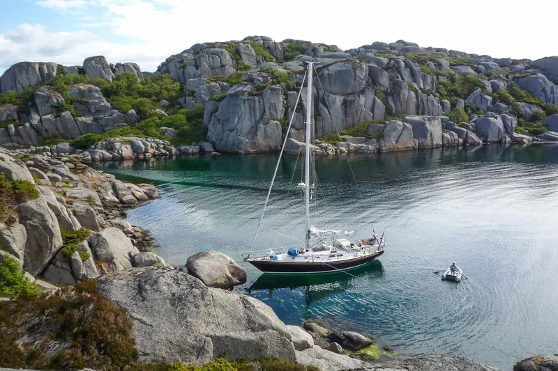 Slide: The Image of Aerial view of 1996 Hinckley Sou'wester 42 MKII sailboat on calm water. - 4