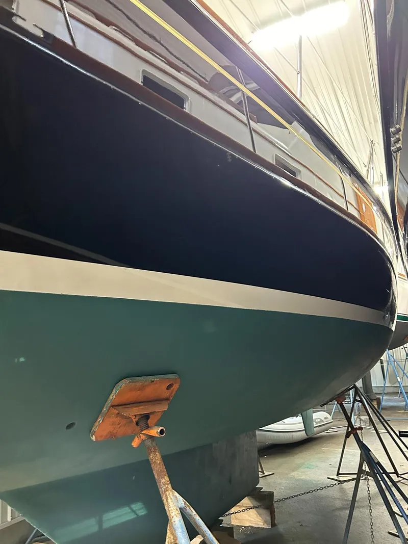 Slide: The Image of Interior view of 1996 Hinckley Sou'wester 42 MKII sailboat with wooden finish and skylights. - 41