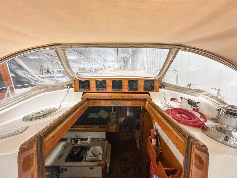 Slide: The Image of Hinckley Sou'wester 42 MKII sailboat being lifted by crane, 1996 model. - 9