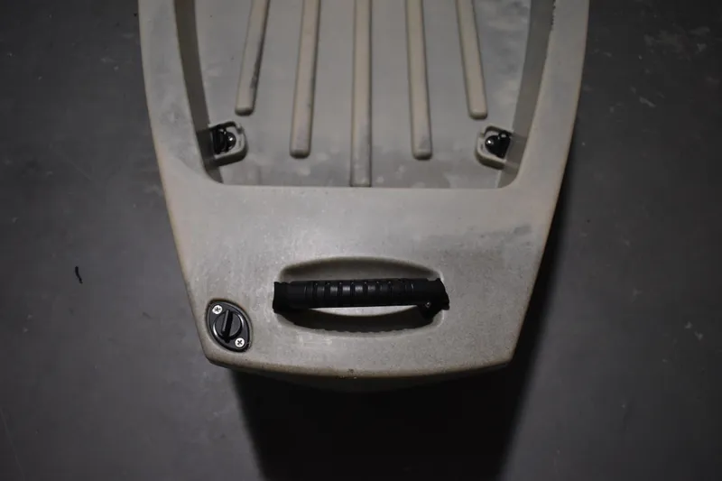 Slide: The Image of 2023 Ascend 10T Sit-On kayak handle and storage compartment, top view. - 10