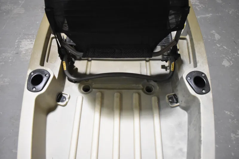 Slide: The Image of 2023 Ascend 10T Sit-On kayak interior with seat and storage compartments. - 9