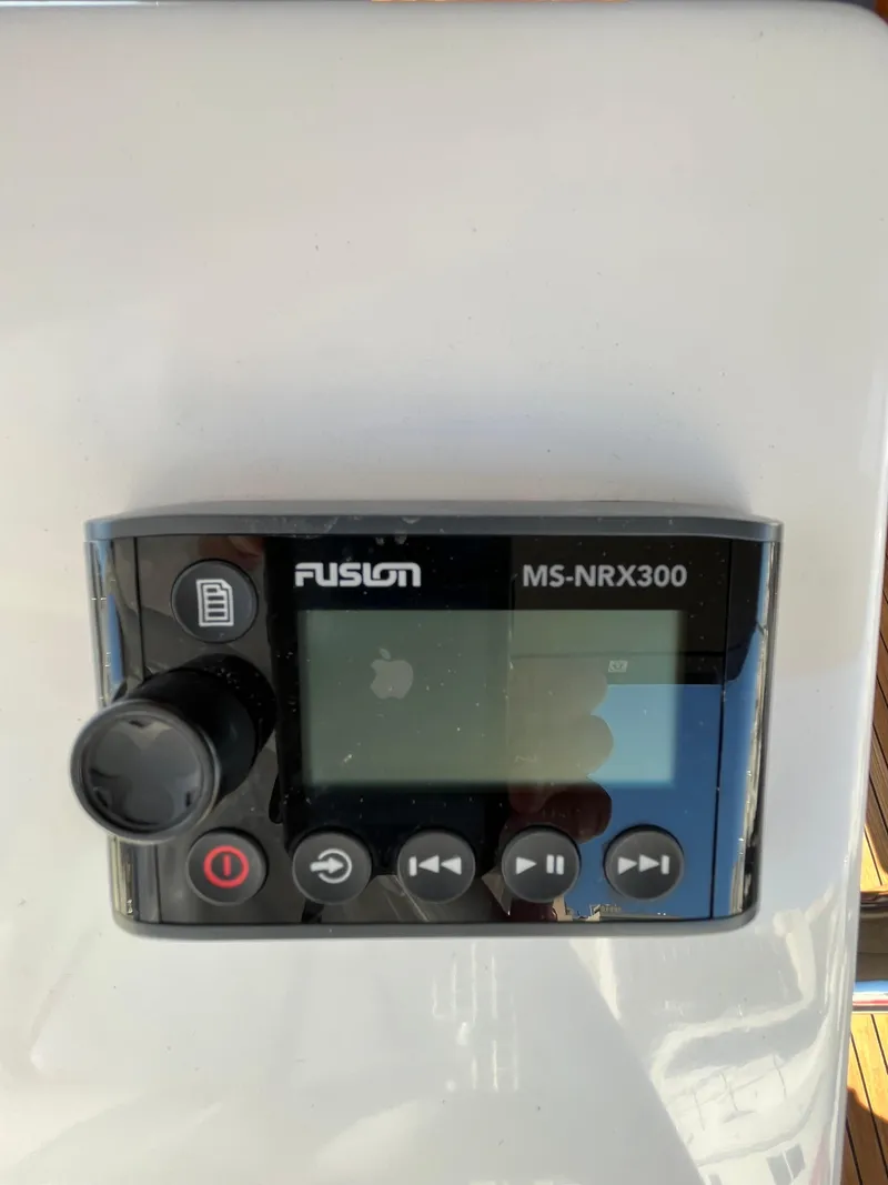 Slide: The Image of Fusion MS-NRX300 marine stereo controller on a 2021 Bavaria C45 yacht. - 23