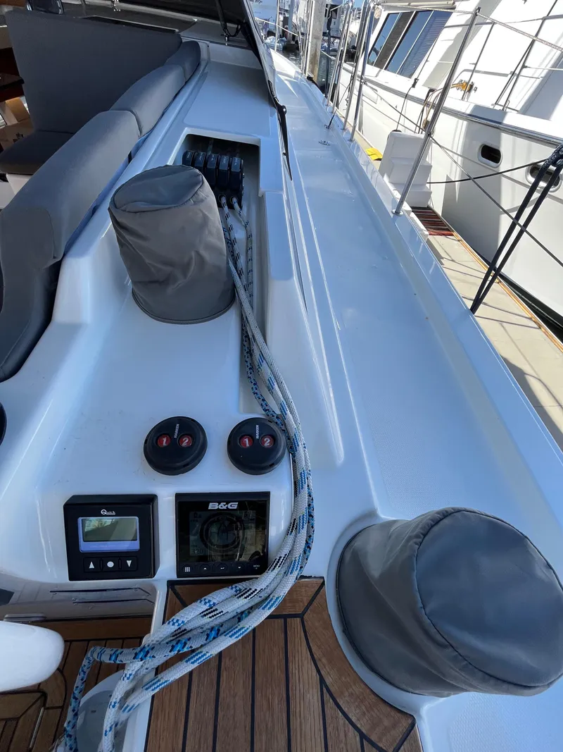 Slide: The Image of Control panel and ropes on a 2021 Bavaria C45 sailboat deck. - 26