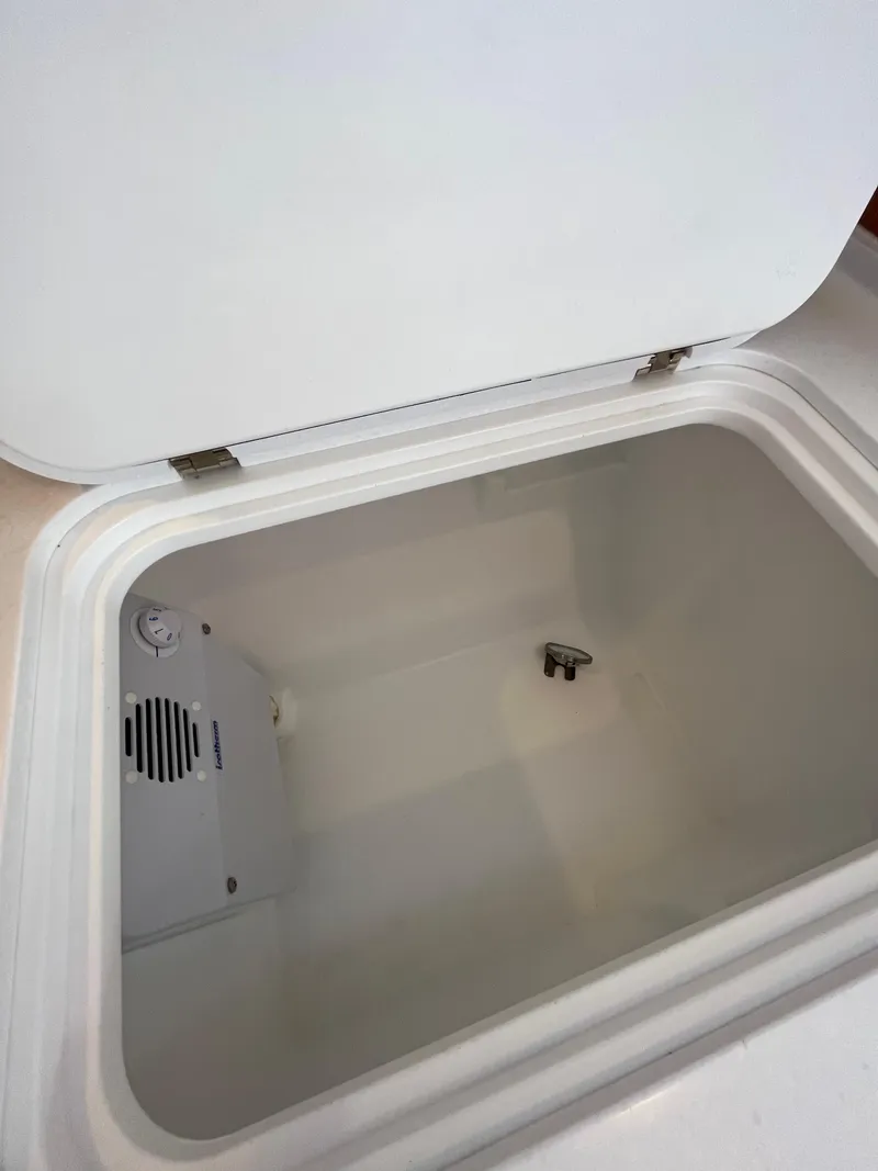 Slide: The Image of Open storage compartment in 2021 Bavaria C45 sailboat. - 38