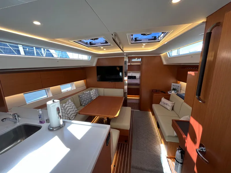 Slide: The Image of Modern interior of 2021 Bavaria C45 yacht with spacious seating and dining area. - 43