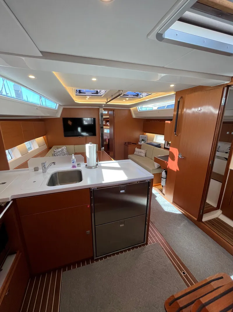 Slide: The Image of Modern interior of 2021 Bavaria C45 yacht with kitchen and seating area. - 48