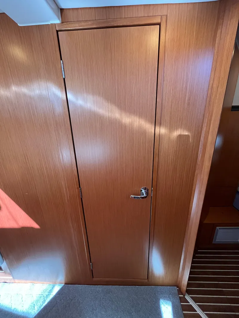 Slide: The Image of Wooden interior door on a 2021 Bavaria C45 sailboat. - 49