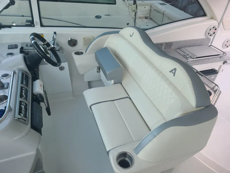 Slide: The Image of 2007 Formula 45 Yacht cockpit with luxurious seating and modern helm. - 10