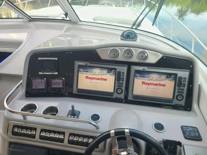 Slide: The Image of Control panel of a 2007 Formula 45 Yacht with Raymarine navigation systems. - 12
