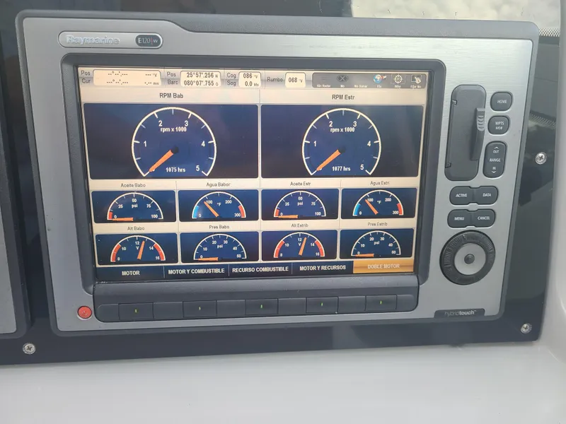 Slide: The Image of Dashboard display of a 2007 Formula 45 Yacht showing engine and system gauges. - 14