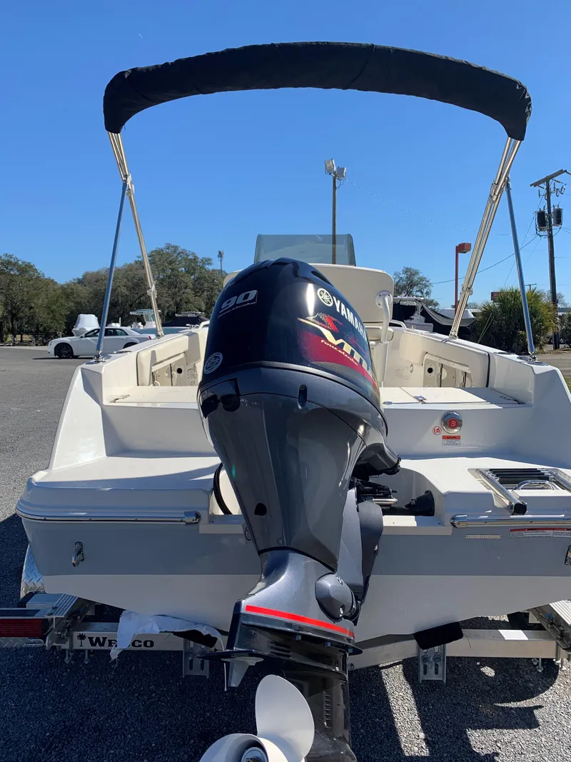 Slide: The Image of 2024 Stingray 173 CC boat with Yamaha 90 outboard motor. - 2