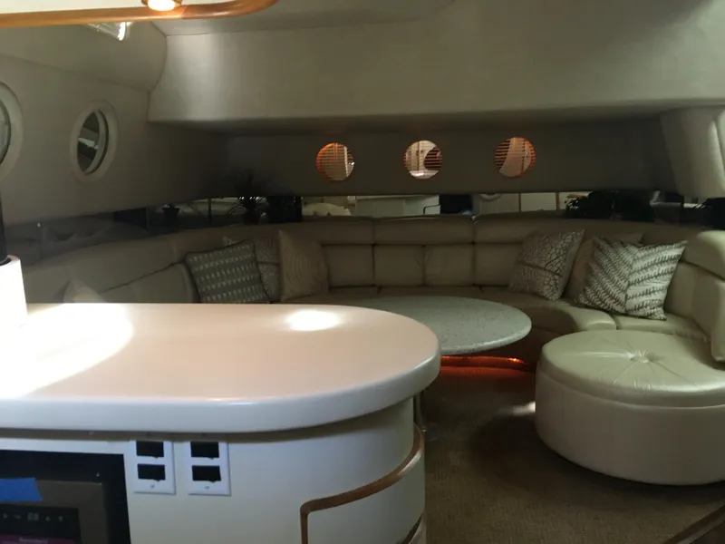 Slide: The Image of Luxurious interior of 1994 Sea Ray 500 Sundancer yacht with plush seating and modern design. - 14