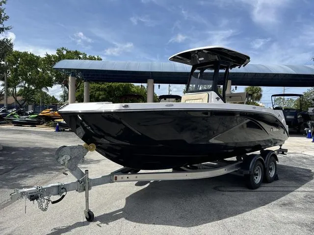 The Image of 2024 Yamaha Boats 222 FSH Sport E on trailer, front view. - 1