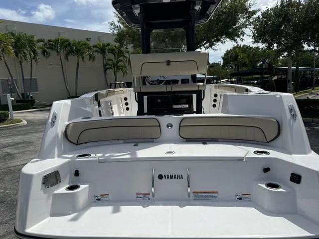 Slide: The Image of 2024 Yamaha Boats 222 FSH Sport E engine compartment with open hatch. - 22