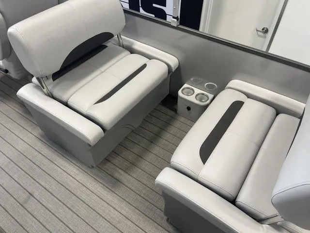 Slide: The Image of 2024 Bentley Pontoons Legacy 243 QSB 3/4 Tube interior seating with cup holders. - 10