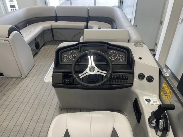 Slide: The Image of 2024 Bentley Pontoons Legacy 243 QSB 3/4 Tube interior helm and seating area. - 11