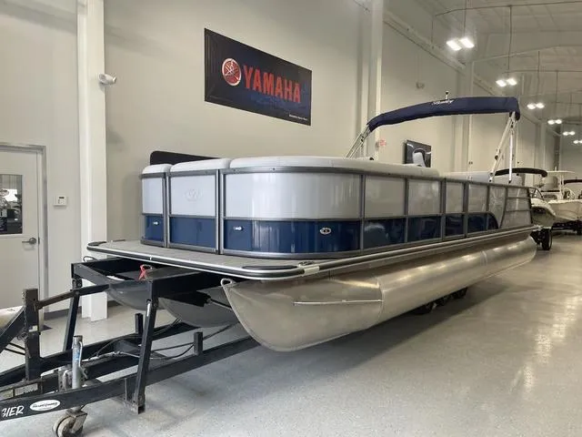 Slide: The Image of 2024 Bentley Pontoons Legacy 243 QSB 3/4 Tube pontoon boat in showroom. - 3
