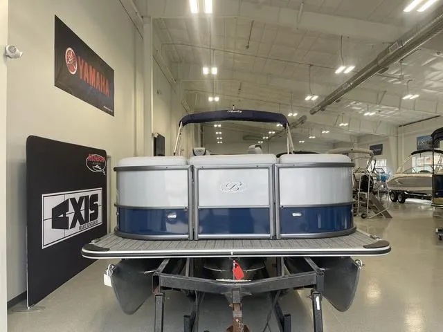 Slide: The Image of 2024 Bentley Pontoons Legacy 243 QSB 3/4 Tube displayed in showroom. - 4