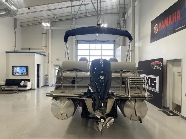 Slide: The Image of 2024 Bentley Pontoons Legacy 243 QSB 3/4 Tube in showroom, rear view. - 5