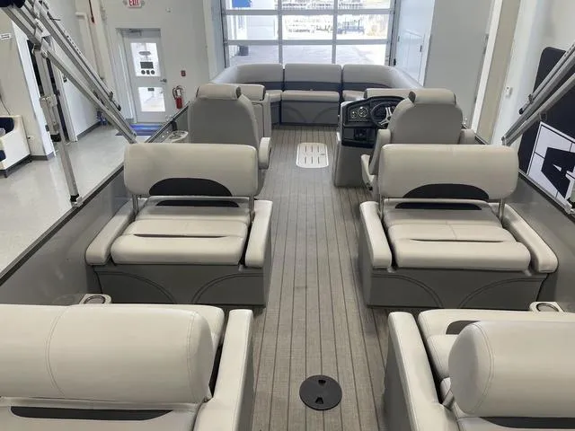Slide: The Image of 2024 Bentley Pontoons Legacy 243 QSB 3/4 Tube interior with luxurious seating and modern design. - 8