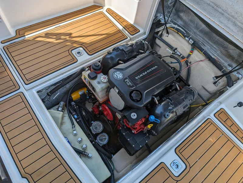 Slide: The Image of 2016 Cutwater 24 boat engine compartment with Volvo Penta engine. - 26