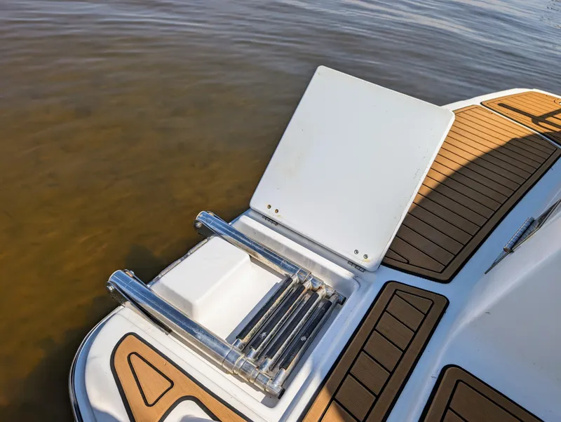 Slide: The Image of 2016 Cutwater 24 boat swim platform with ladder. - 7