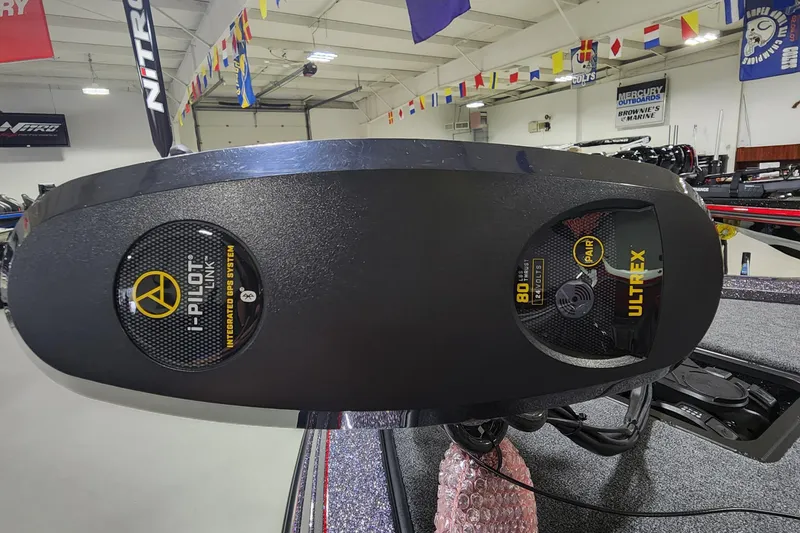 Slide: The Image of 2024 Ranger Z518 boat with Minn Kota Ultrex trolling motor in showroom. - 2