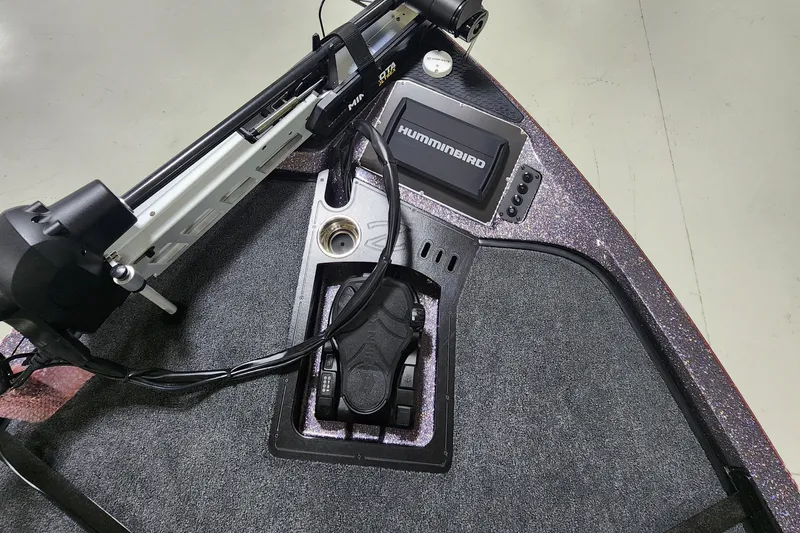 Slide: The Image of 2024 Ranger Z518 boat deck with Humminbird fish finder and foot pedal. - 3