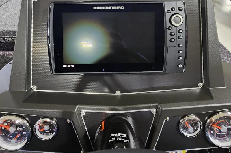 Slide: The Image of 2024 Ranger Z518 boat dashboard with Humminbird Helix 10 fishfinder and gauges. - 7