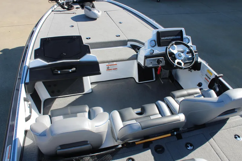 Slide: The Image of 2024 Nitro Z20 boat interior with steering wheel and seating, featuring Humminbird electronics. - 11