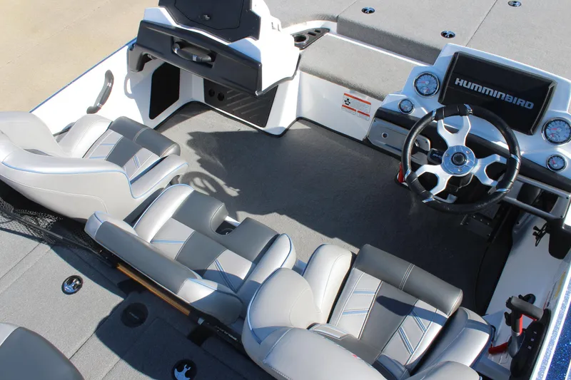 Slide: The Image of 2024 Nitro Z20 boat interior with steering wheel and seating, featuring Humminbird electronics. - 17