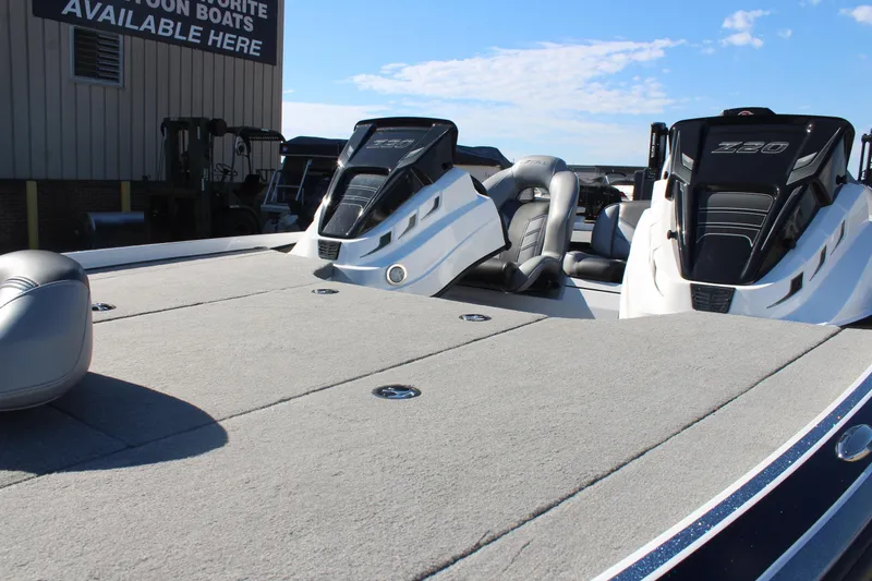 Slide: The Image of 2024 Nitro Z20 boat with spacious deck and dual seating, displayed outdoors. - 26