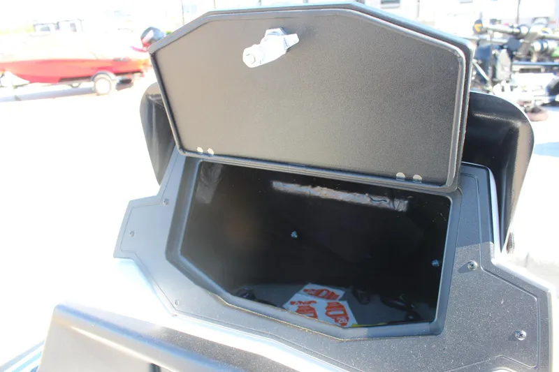 Slide: The Image of Open storage compartment on 2024 Nitro Z20 boat, showcasing interior space. - 28