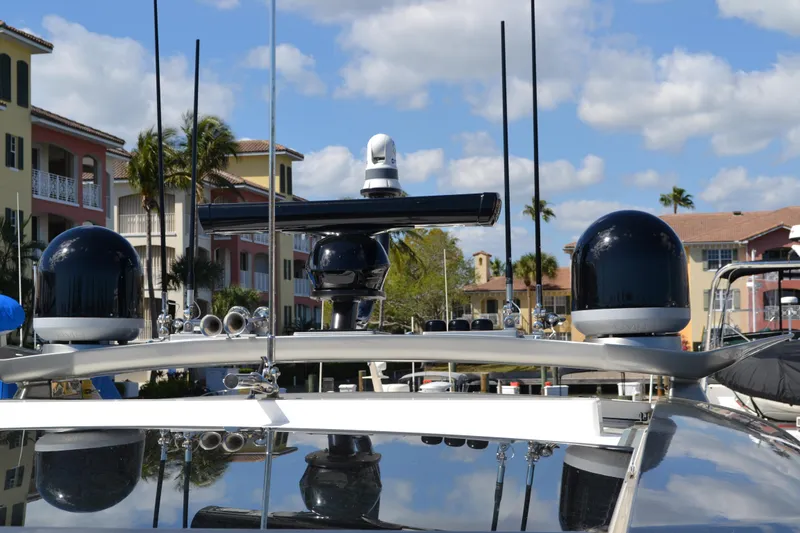 Slide: The Image of 2022 Riviera Sport Yacht 5400 Platinum Edition with advanced radar and communication equipment. - 17