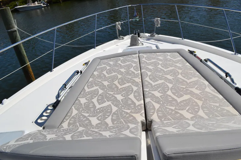 Slide: The Image of Luxurious sunbathing area on 2022 Riviera Sport Yacht 5400 Platinum Edition. - 19