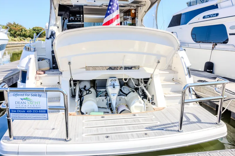 Slide: The Image of 2022 Riviera Sport Yacht 5400 Platinum Edition for sale at marina dock. - 26