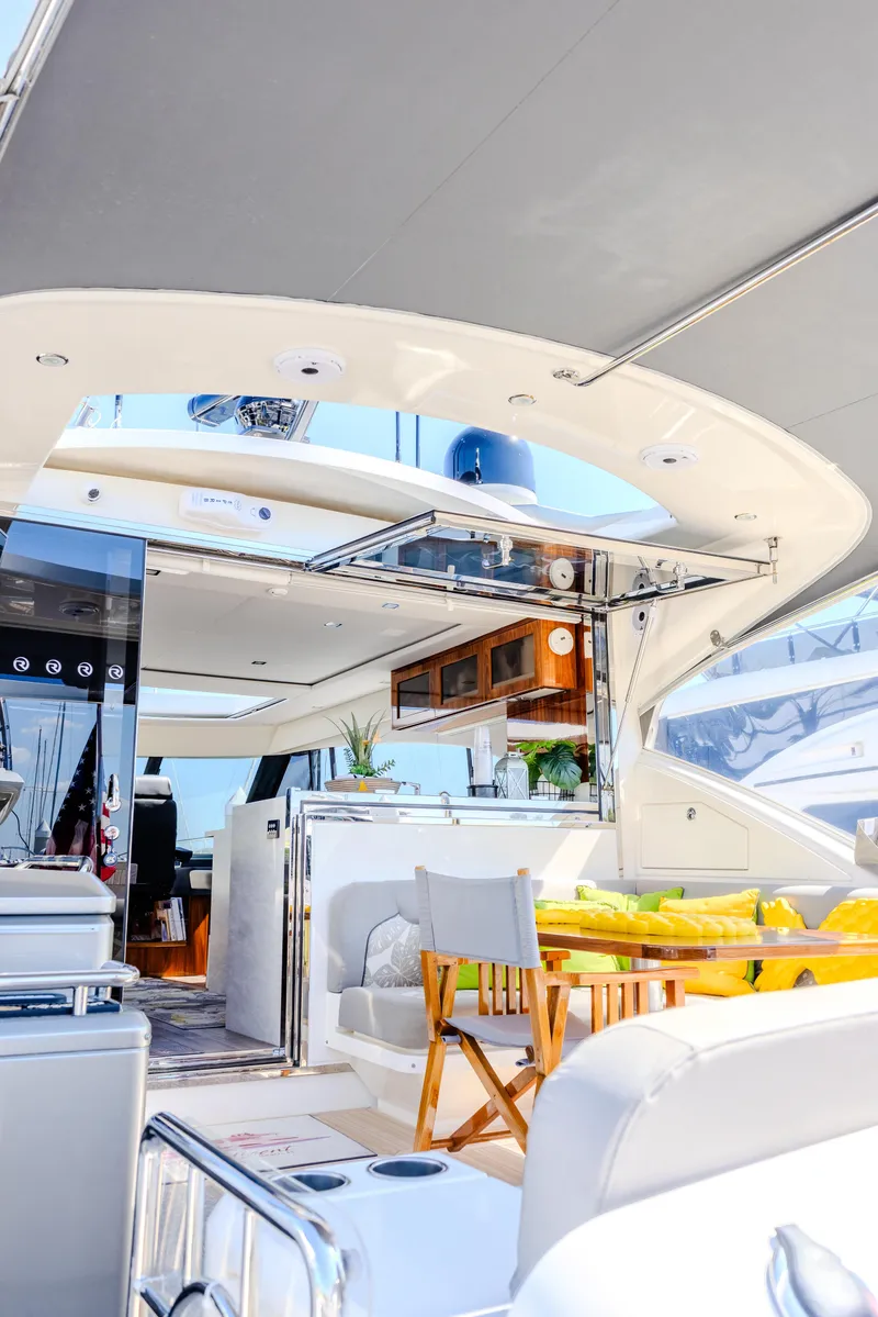 Slide: The Image of Luxurious interior of 2022 Riviera Sport Yacht 5400 Platinum Edition, featuring elegant seating and modern design. - 30