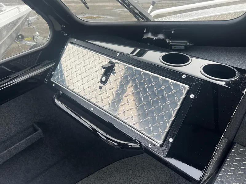 Slide: The Image of Interior of 2024 Thunder Jet 21 Chinook OS boat with diamond plate storage compartment. - 10