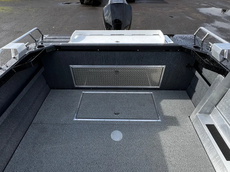 Slide: The Image of 2024 Thunder Jet 21 Chinook OS boat interior with storage compartments. - 19