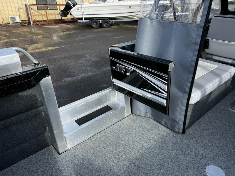 Slide: The Image of 2024 Thunder Jet 21 Chinook OS boat interior with sleek design and seating. - 21