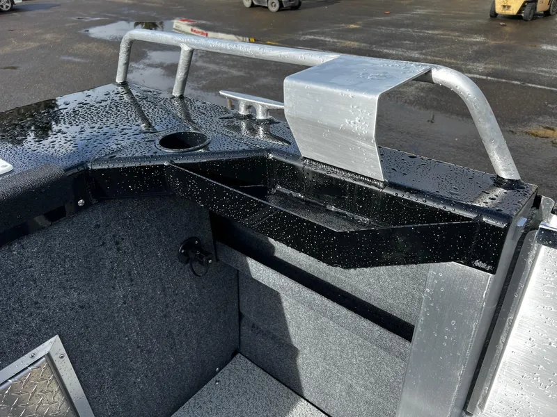 Slide: The Image of 2024 Thunder Jet 21 Chinook OS boat interior with wet surfaces and storage compartments. - 22