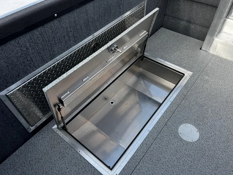 Slide: The Image of 2024 Thunder Jet 21 Chinook OS boat storage compartment with open hatch. - 24