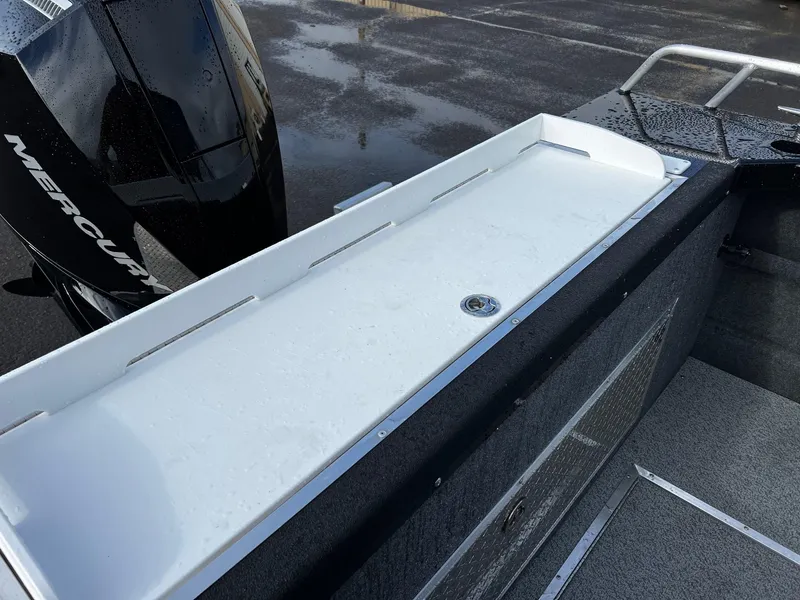 Slide: The Image of 2024 Thunder Jet 21 Chinook OS boat with Mercury engine, rear deck view. - 25