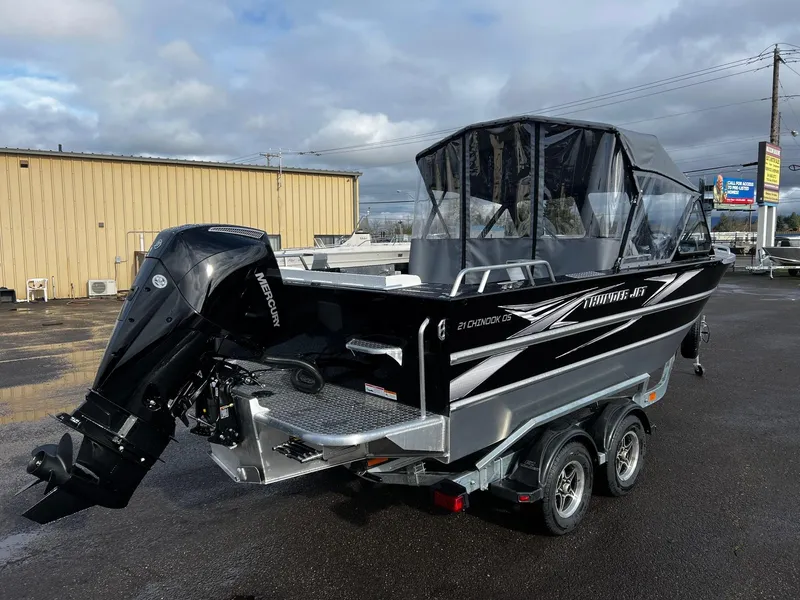 Slide: The Image of 2024 Thunder Jet 21 Chinook OS boat with outboard motor on trailer. - 3