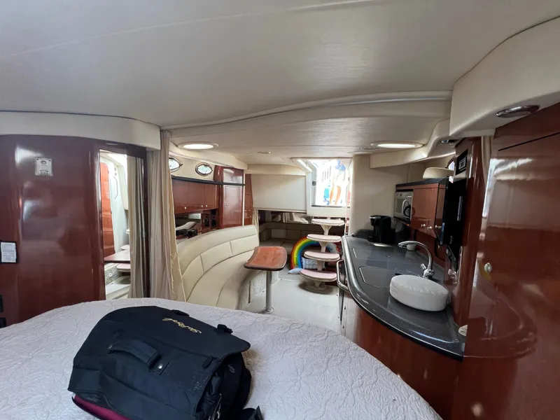 Slide: The Image of Interior of 2006 Sea Ray 340 Sundancer yacht with modern amenities and elegant design. - 15