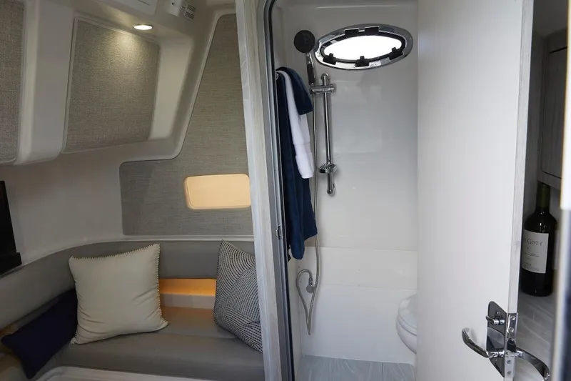 Slide: The Image of 2024 Regulator 37 boat interior with advanced navigation system and sleek design. - 11