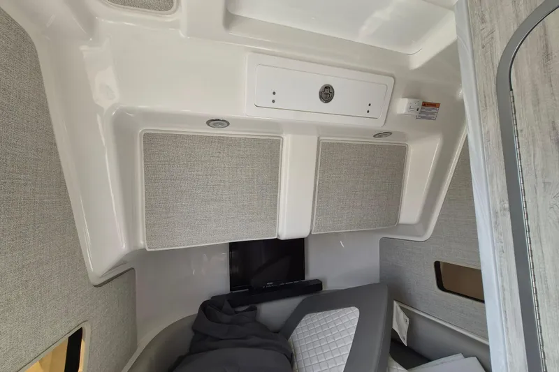 Slide: The Image of 2024 Regulator 37 cabin interior with modern design and comfortable seating. - 22