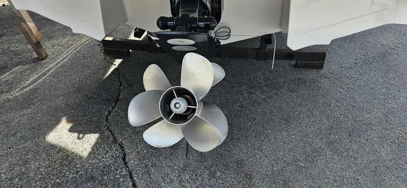 Slide: The Image of 2024 Monterey 238 Super Sport boat propeller on asphalt. - 10