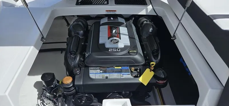Slide: The Image of 2024 Monterey 238 Super Sport boat engine compartment. - 9
