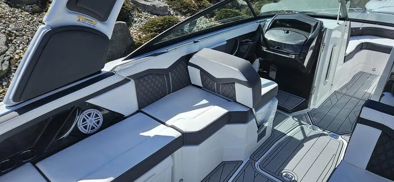 Slide: The Image of 2024 Monterey 258 boat interior with modern seating and sleek design. - 5